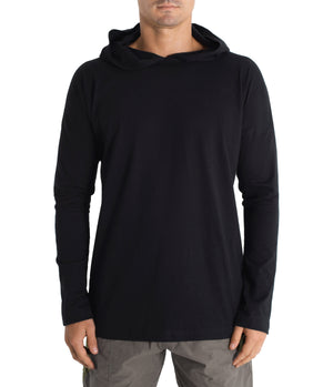 Black long-sleeve hoodie worn by a person on a white background