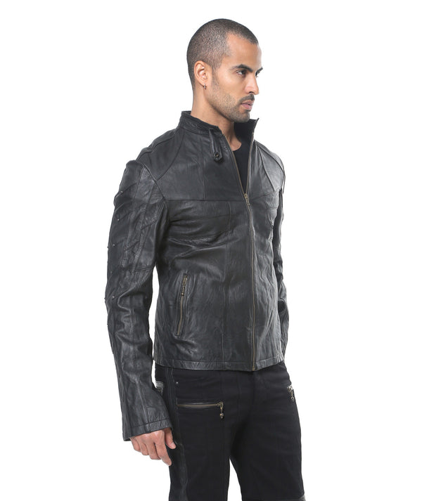 This image features a stylish "Hornet Jacket" modeled by a male. The jacket is crafted from black leather and features a slim fitting design, highlighting a modern and sleek look.