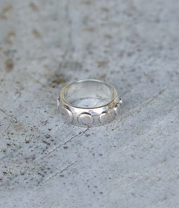 Handmade silver ring band with circle detail. Can be worn by a man or a woman, unisex and minimalist.