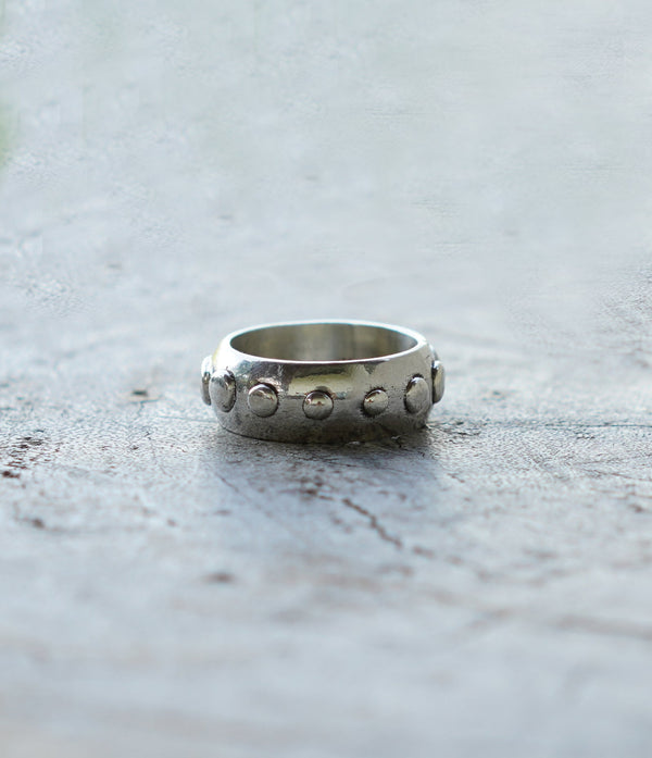 Handmade silver ring band with circle detail. Can be worn by a man or a woman, unisex and minimalist.